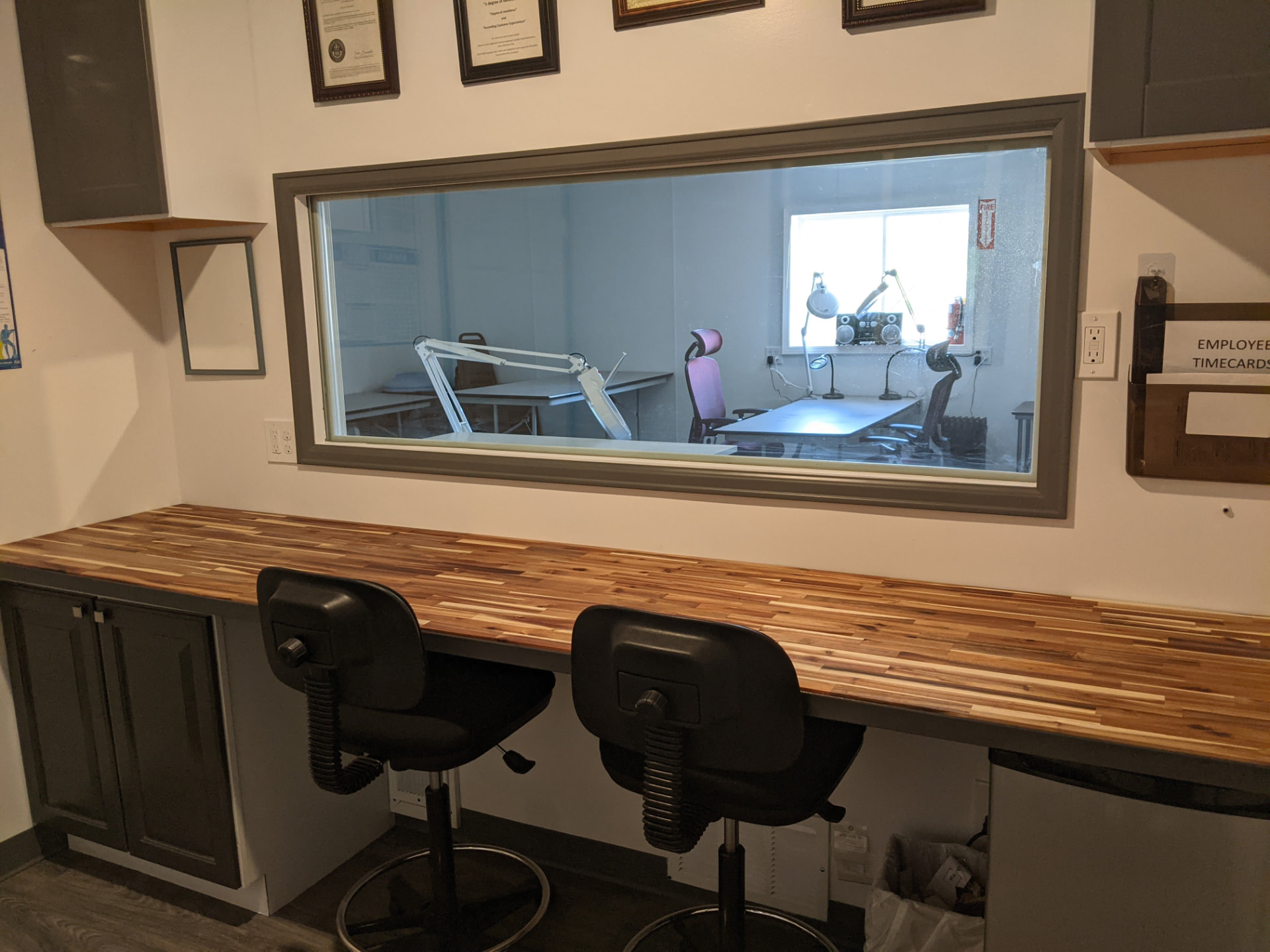 Cleanroom observation window viewed from the CMI office
